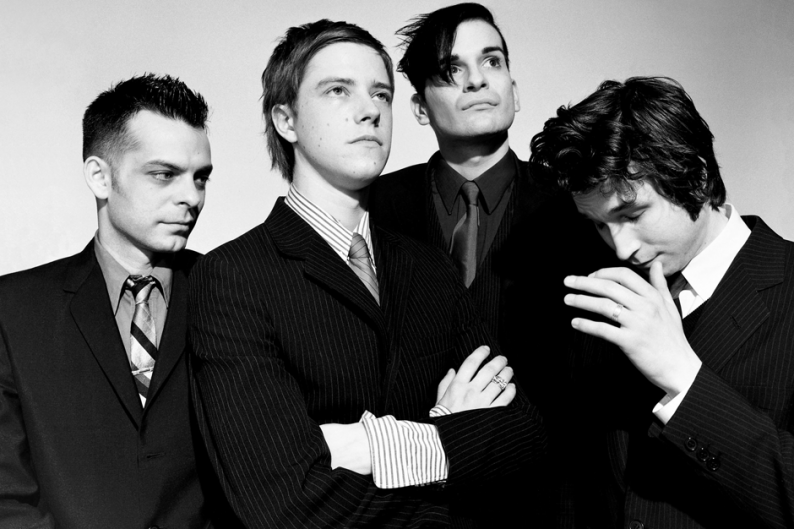 Interpol in 2002: Sam Fogarino, Paul Banks, Carlos D., Daniel Kessler