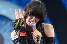 Karen O, sporting a 'Get Well, MCA' armband at All Points West 2009 / Photo by Theo Wargo/WireImage