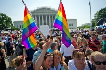 People gathered outside the US Supreme Court in Washington, DC on June 26, 2013 