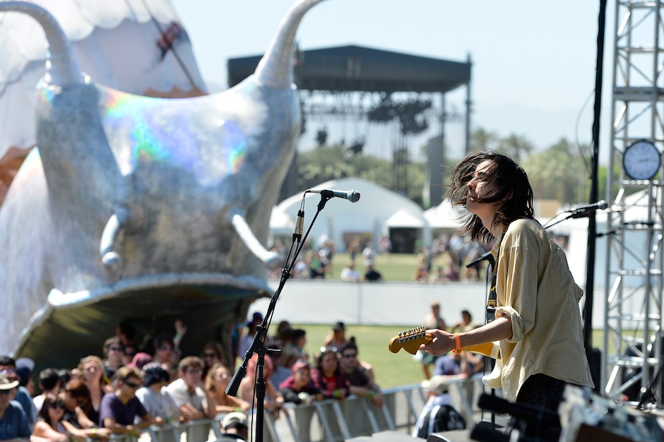 Cullen Omori of Smith Westerns, moments before being devoured by giant snail / Photo by Frazer Harrison/Getty Images