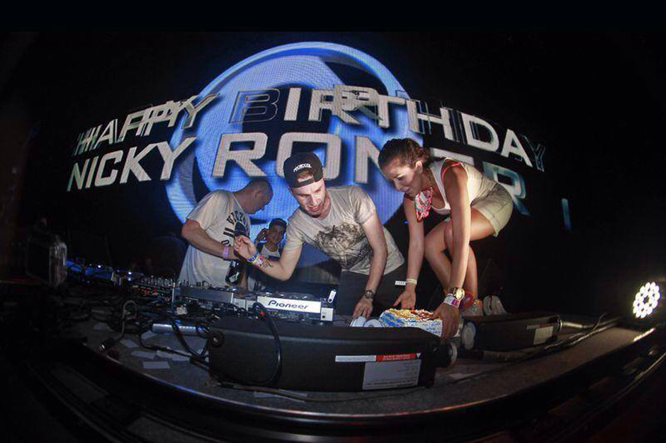 Nicky Romero blows out birthday candles shortly before the explosion