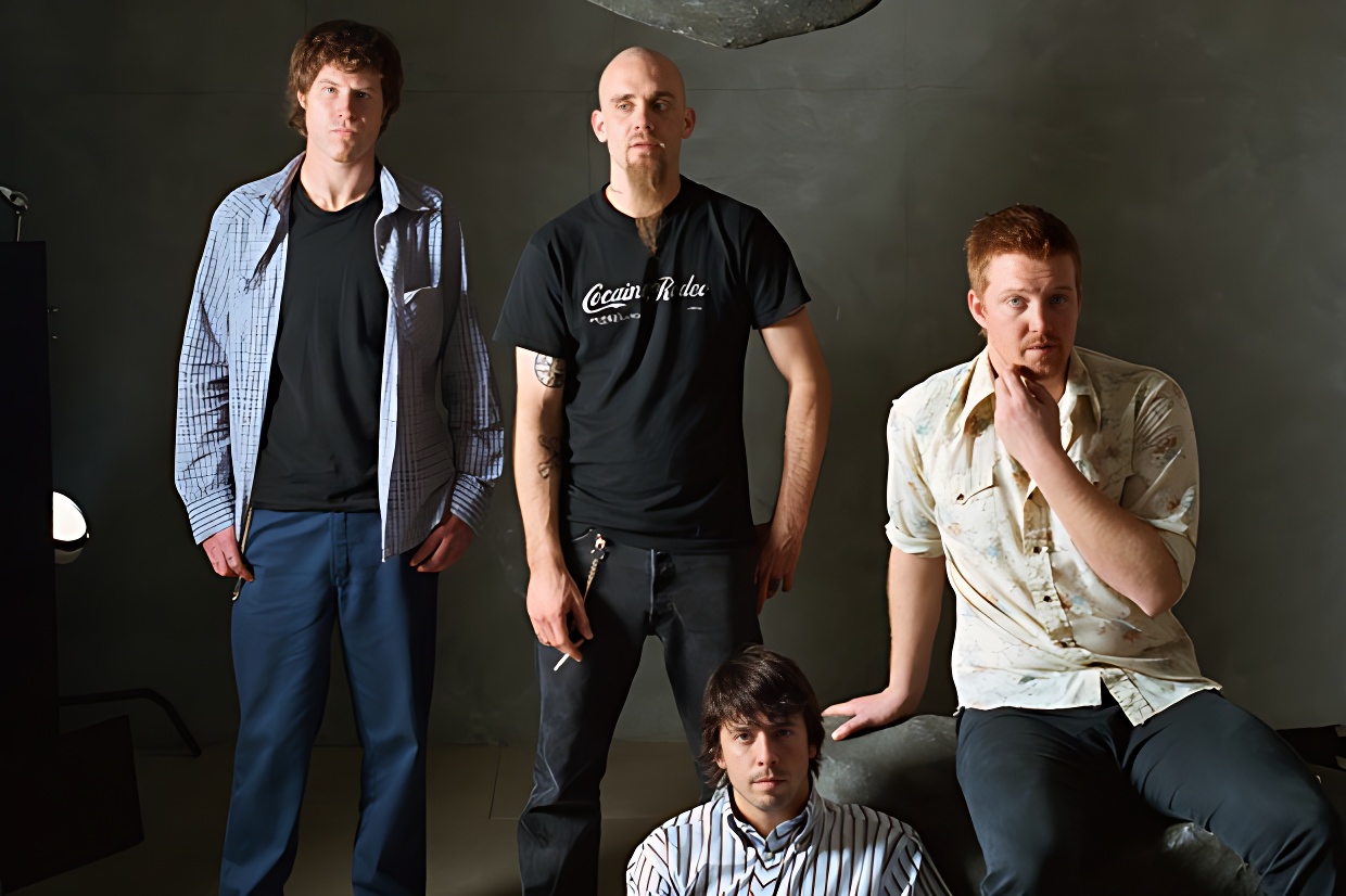 Mark Lanegan, Nick Oliveri, Dave Grohl, and Josh Homme of Queens of the Stone Age