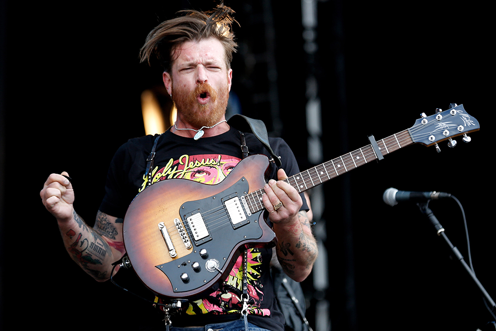 Eagles of Death Metal singer: 'One kid survived by hiding under my