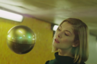 Rosamund Pike Stars in Massive Attack and Young Fathers ‘Voodoo in My Blood’ Video