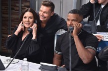 Catherine-Zeta-Jones-Ryan-Seacrest-Jamie-Fox-hand-in-hand-2017-billboard-1548-1505313425
