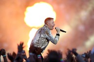 Watch Macklemore’s Controversial Performance At National Rugby League Grand Final