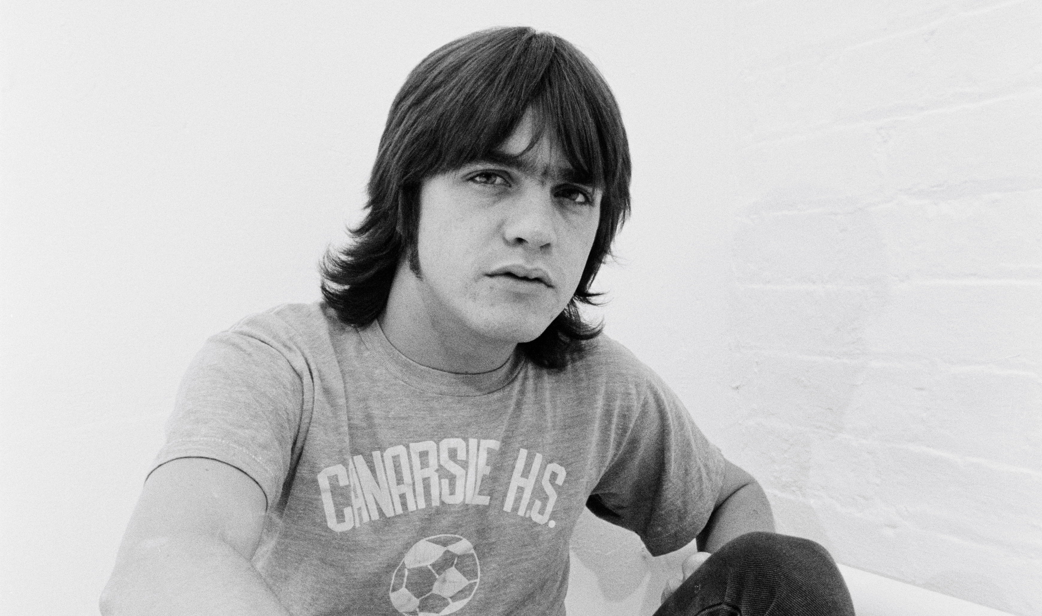 Colin Burgess, Original AC/DC Drummer, Dies At 77