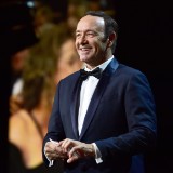 Kevin Spacey Delivers Pizza to Paparazzi While Wearing a 
