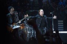 u2 bono edge play christmas songs busking homeless benefit