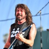 Watch Dave Grohl Fall Off the Stage in Vegas After Chugging a Beer