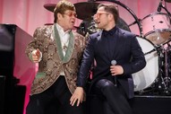 Watch Elton John & Taron Egerton Perform “Tiny Dancer” at John’s Oscars Party