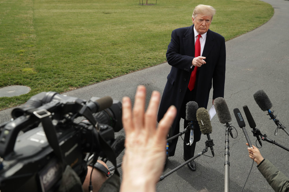 Trump Says "No Collusion" to Reporters on White House Driveway