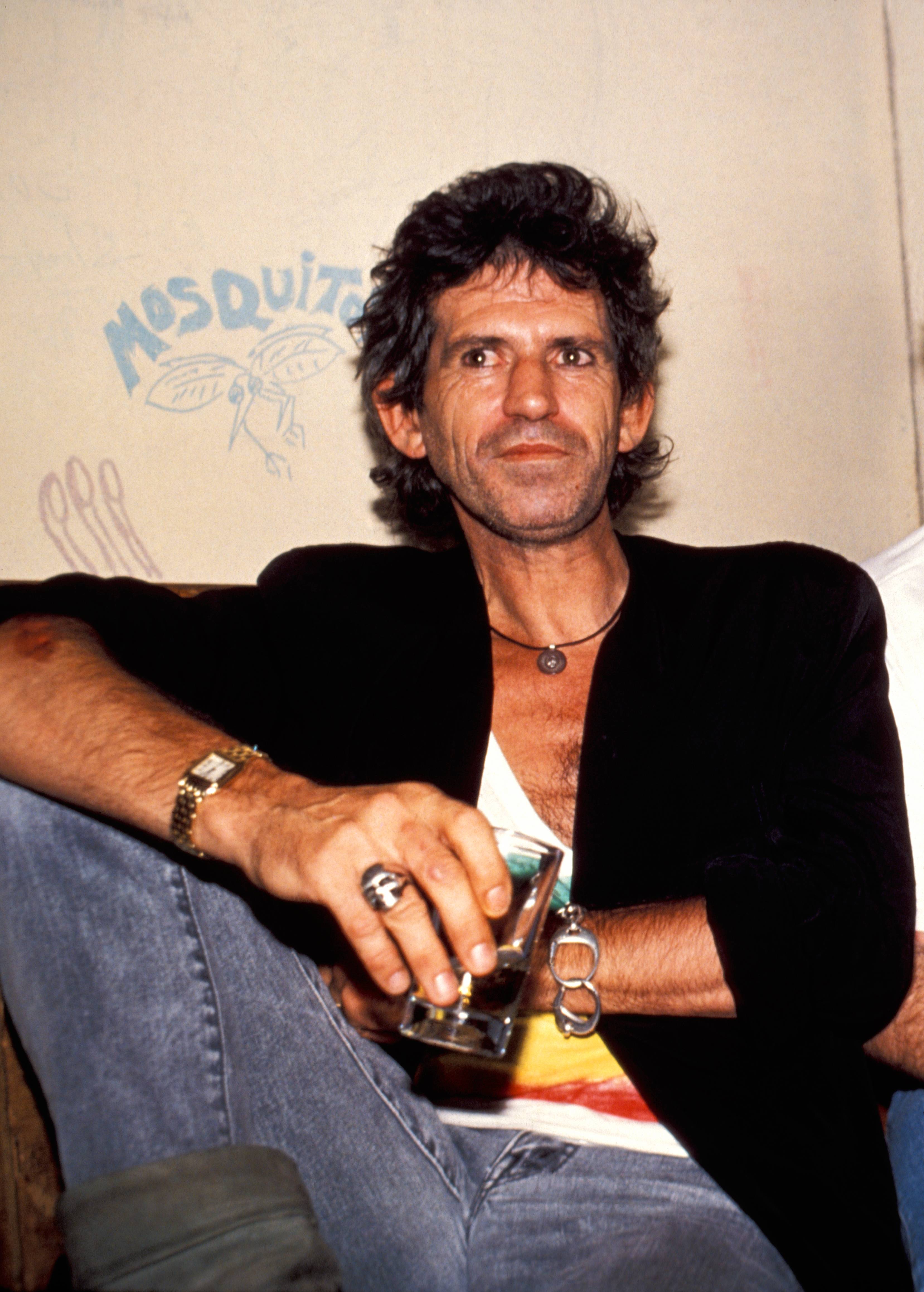Keith Richards: Our 1985 Cover Story, <i></p>
<p><b>How is Anita [Pallenberg, mother of his first two children]?</b></p>
<p>Anita’s doing very well. Very well. Cleaned up her whole act. I’m very proud of her. Her and Patti actually talk to each other. I’m either very lucky or I’ve done something right. There is nothing hidden from anybody. They talk to each other, visit each other. And Anita still knits me sweaters.</p>
<p>Maybe it’s because we never had the divorce thing. By not getting married and divorced, where the lawyers force you to hate each other, just from the point of “As your lawyers, Mrs. So-and-so, I advise you to get this much out of that sonofabitch.” And I suggest we change the venue of this divorce, Mr. So-and-so, because they can’t screw so much out of you here.” So you become implacable enemies. Anyone that survives a divorce and still talks to each other is a miracle. People can actually get along a lot better without resorting to the law.</p>
<p><b>Then why did you make it legal with Patti?</b></p>
<p>Because it’s me now, and it’s Patti, and it’s a different point of view. Anita and I, in the ’60s, were never interested in marriage. It seemed an archaic and dumb thing to do just to have a child. And that was then and that was Anita, and that was me and Anita. Patti and I have a different relationship.</p>
<p>And besides, shit, I’m gonna try anything. And if I’m gonna try anything like marriage, I’m only gonna try it once. And if I’m gonna try it once, it’s gonna be with this chick. ‘Cuz I’m not about to try it twice. I ain’t a Texan, I ain’t Bobby Keys—if he loves her, he’s gotta marry her. It’s just a different point of view. For me, it’s worked out fine, ‘cuz I can still talk to my ex-whatever. And there are other exes before Anita, and I can still talk to <i>them</i>.</p>
<p><b>How did you meet Patti?</b></p>
<p>It was engineered by other people, matchmakers. It was my birthday [1979]. We were all in New York. A few people had the same idea at the same time for a year before I ever met Patti. Every other night, somebody would say, “Oh, you should meet this Patti Hansen.” I kept asking, “Why should I meet this Patti Hansen.” I found out later. But it was one of those inevitable things. She was getting the same stuff. Until eventually somebody said, “They’re never gonna get it together themselves. We have to throw them together.”</p>
<p><b>What did her family think of you at first?</b></p>
<p>The first time I went to meet her parents, I was out of it. Out of my brain. I’d been up for days, got drunk, figured I’d keep myself real mellow. Instead, I wound up smashing up stuff. But they dug it. I went crazy and it didn’t offend them. I could’ve blown it, you know, “Never come back here again!” I was my worst.</p>
<p>After all this time, I’d never been through this trip, meeting a girl’s parents, so it was important to me. Try to be real cool, and I overdid it. I went totally over the top. But they dug me for it. That was the first indication that this was family I could do with if they could take that.</p>
<p><b>The old “Would you let your daughter marry a Rolling Stone?”</b></p>
<p>I’m still not finished with that, after all these years. Once those things are pinned on you, they stick with you forever. It might seem slightly silly when you’re 60 or 70 years old.</p>
</p><p>To see our running list of the top 100 greatest rock stars of all time, <a href=