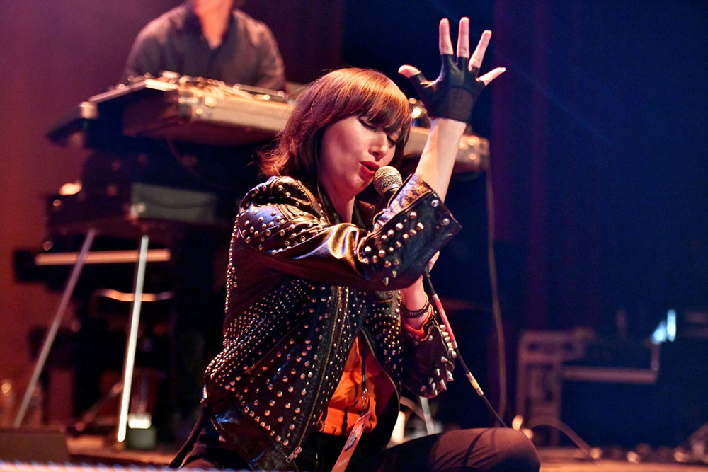Karen O performing onstage