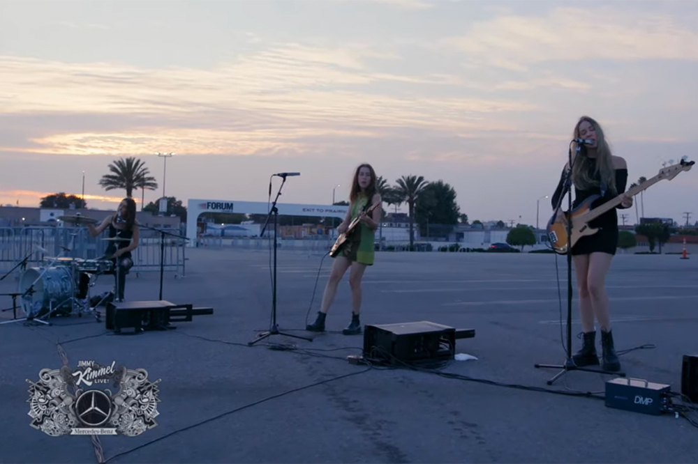 Haim performing in The Forum Parking Lot