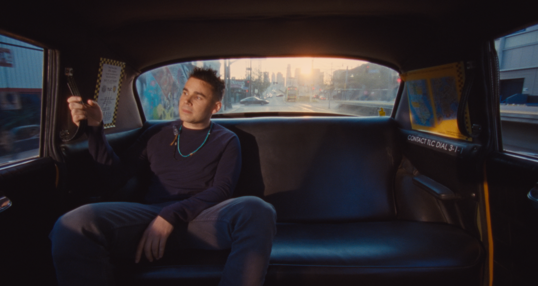 Rostam Shares ‘From the Back of a Cab’ Single and Video Featuring HAIM, Charli XCX and More
