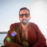 This is an image of Nicolas Cage in The Unbearable Weight of Massive Talent.