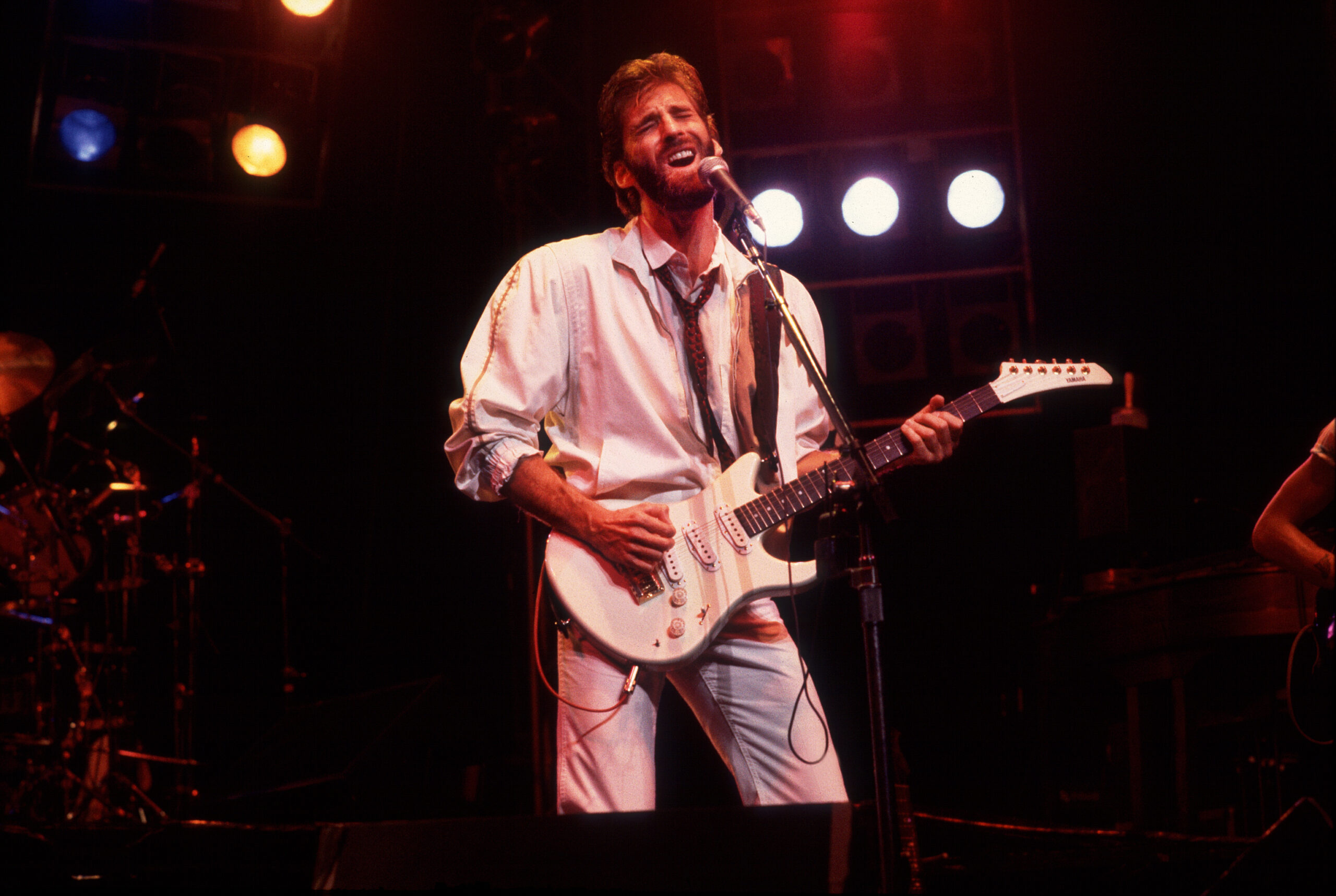 Kenny Loggins on stage in 1983. Photo: Paul Natkin / Getty Images