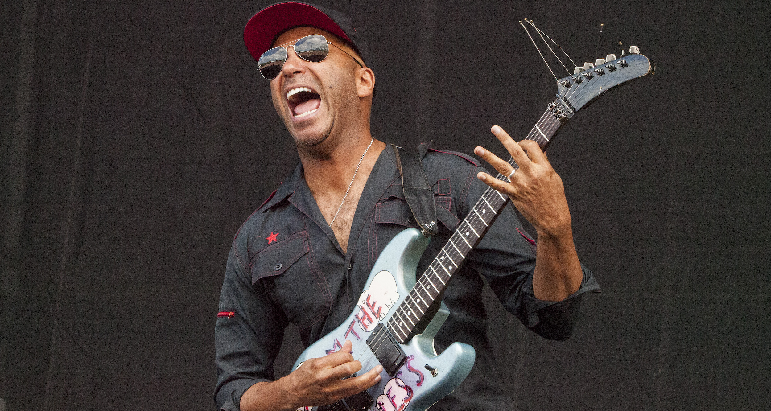 Tom Morello tackled by security during Rage Against the Machine show