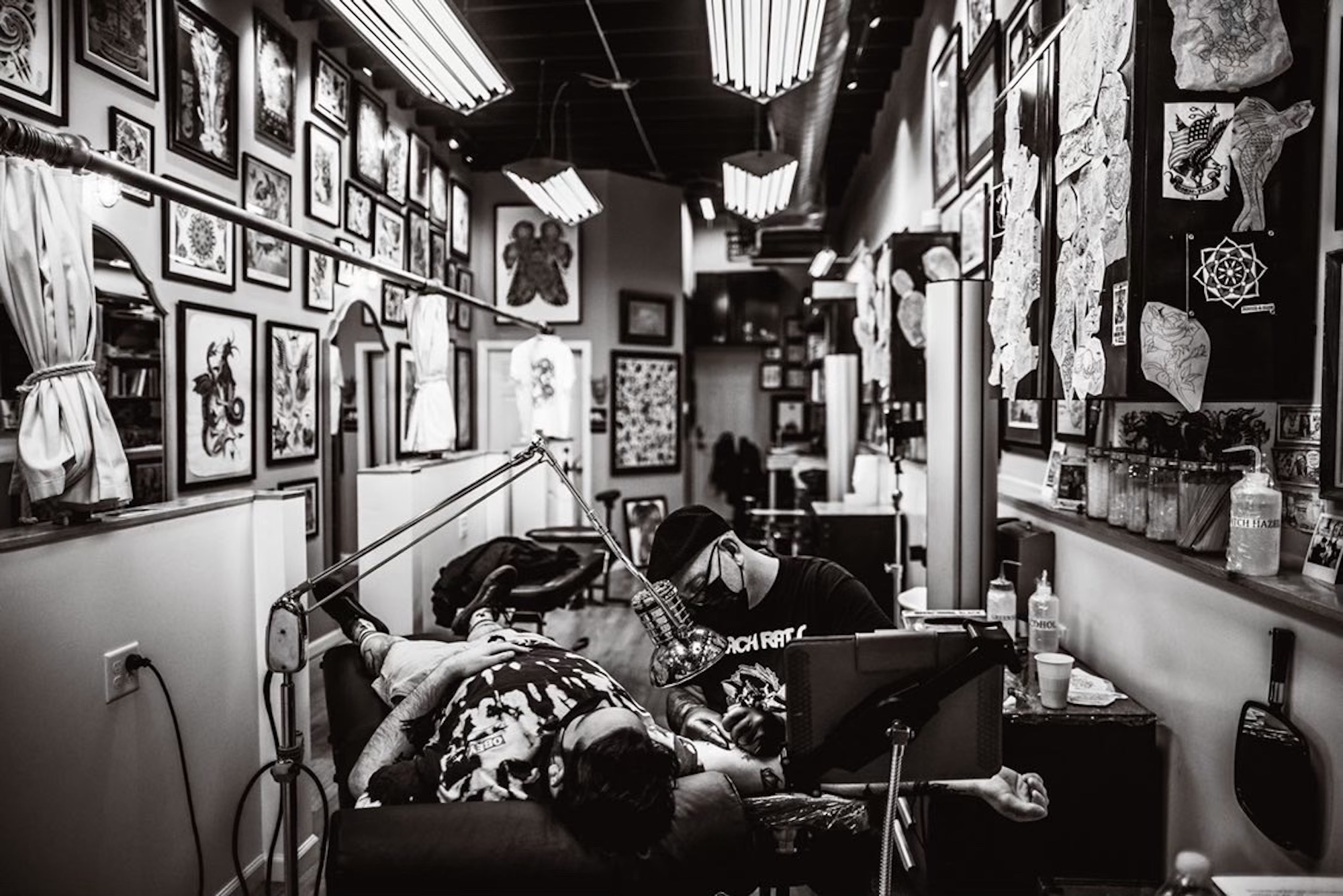 Bouncing Souls bassist Bryan Kienlen tattoos in his own shop in New Jersey. (Photo by Ryan Joh