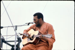 Woodstock. Richie Havens performing at Woodstock Music Festival in 1969.