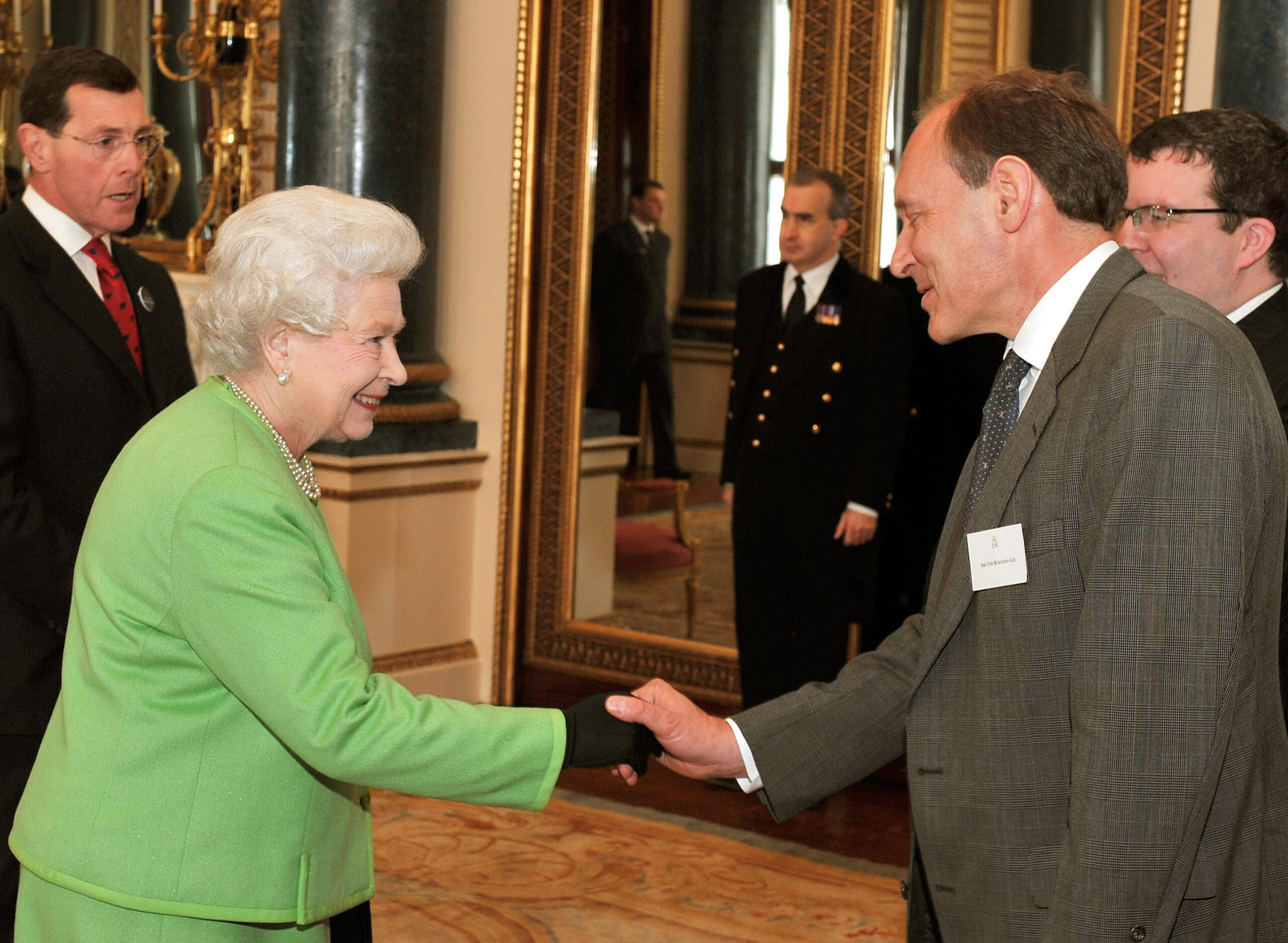 The most recently departed Queen Elizabeth II, giving Sir Tim Berners-Lee, who invented the World Wide Web, some SEO tips at an event for the relaunch of the Monarchy website (www.royal.gov.uk). (Credit: John Stillwell/WPA Pool/Getty Images)