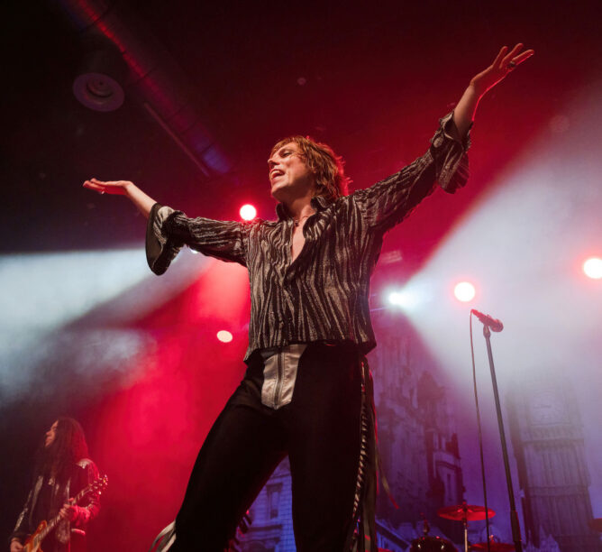 Luke Spiller performs with The Struts during a concert at the Huxleys Nueue Welt on October 16, 2024 in Berlin. (Credit: Frank Hoensch/Redferns)