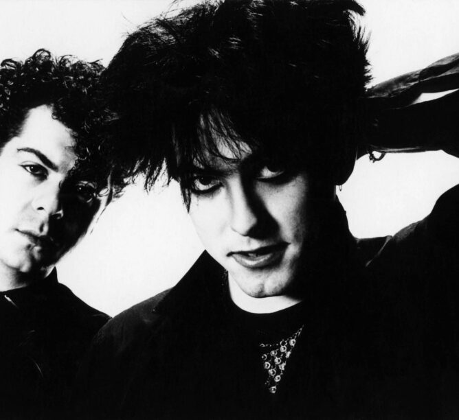 Lol Tolhurst and Robert Smith of The Cure, 1983. (Credit: Fin Costello/Redferns)