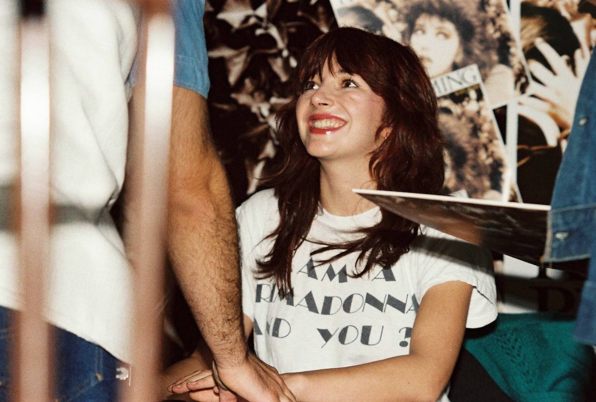 Kate Bush signs her new album 'The Dreaming' for fans in 1982. (Credit: Pete Still/Redferns)