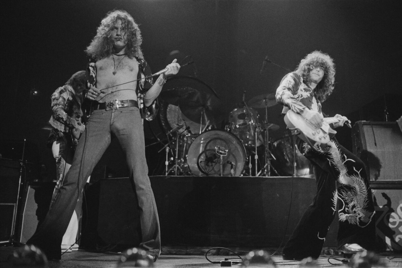 John Paul Jones, Robert Plant and Jimmy Page performing at Earl's Court, London, May 1975. (Credit: Michael Putland/Getty Images)