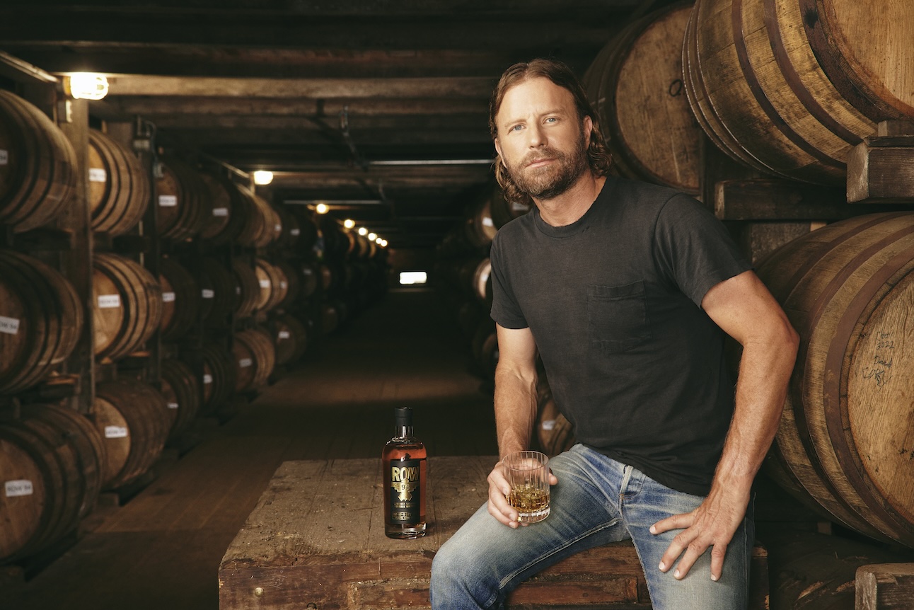 Bentley with his Row 94 bourbon. (Credit: Robby Klein) 
