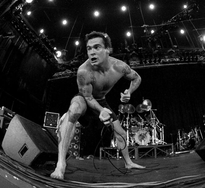 Singer/Songwriter Henry Rollins performs during Lollapalooza at Lakewood Amphitheater in Atlanta Georgia, 1991. (Credit: Rick Diamond/Getty Images)