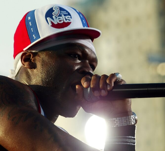 50 Cent performs during a taping for "MTV Spring Break 2003" in Miami Beach, Florida. (Credit: Scott Gries/Getty Images)