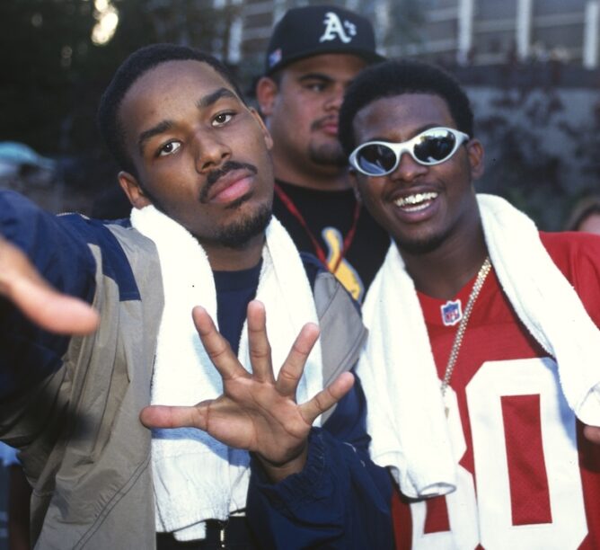 Yukmouth (L) and Numskull of Luniz pose during KMEL Summer Jam at Shoreline Amphitheatre in 1995. (Credit: Tim Mosenfelder/Getty Images)