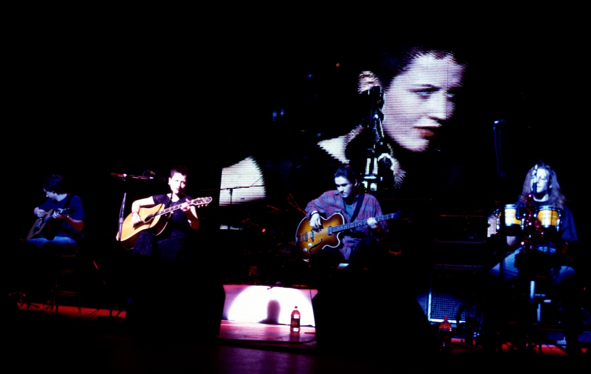 Dolores O'Riordan of the Cranberries, performs on stage with her bandmates in Los Angeles, California in 1994. (Credit: Lester Cohen/Getty Images)