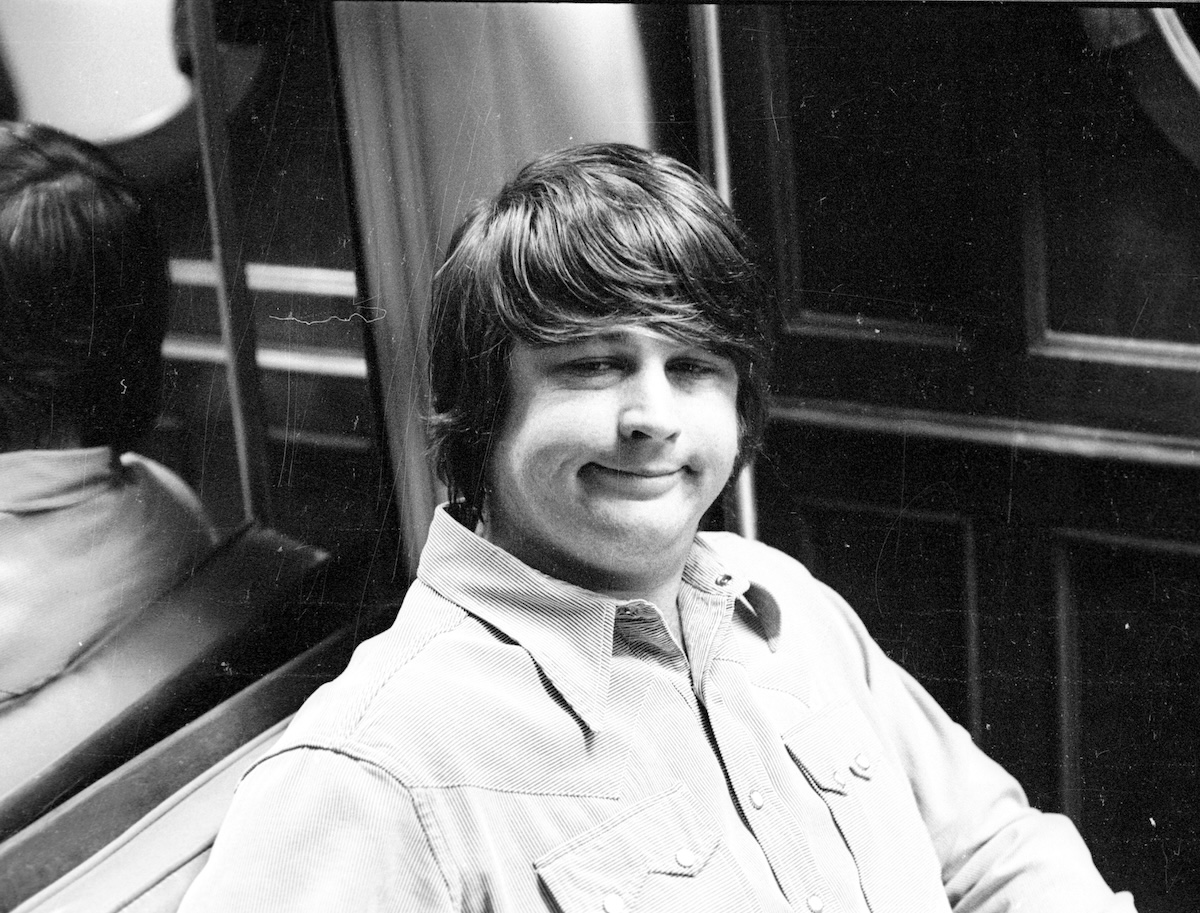 Brian Wilson of the the Beach Boys relaxes backstage in 1966. (Credit: Michael Ochs Archives/Getty Images)