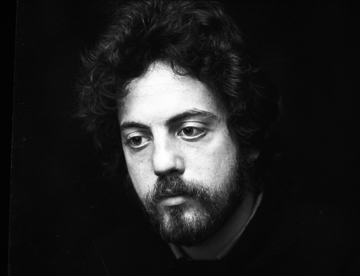 Billy Joel in 1976. (Credit: Gijsbert Hanekroot/Redferns)