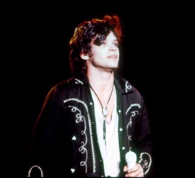 John Mellencamp performs onstage in 1985. (Credit: Ron Pownall/Michael Ochs Archives/Getty Images)
