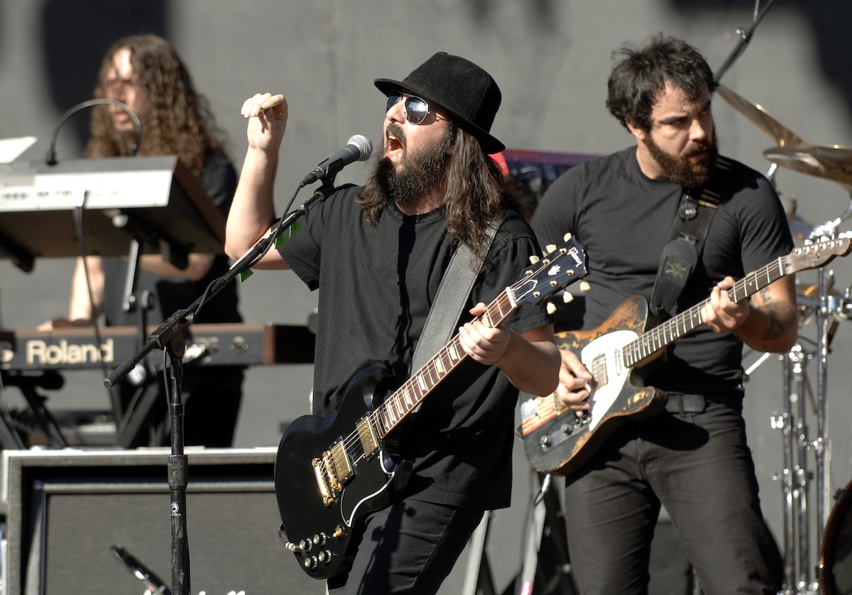 Danny Shamoun, Daron Malakian, and Franky Perez of Scars on Broadway perform in 2008. (Credit: Tim Mosenfelder/Getty Images)