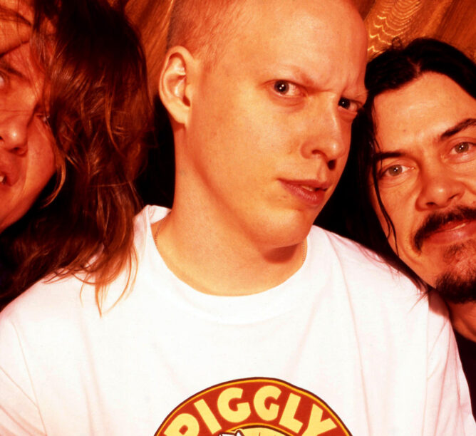 Butthole Surfers, August 1996: (L-R) Guitarist Paul Leary, drummer King Coffey, and lead vocalist/keyboards Gibby Haynes of the American rock band the Butthole Surfers in New York, New York. (Credit: Bob Berg/Getty Images)