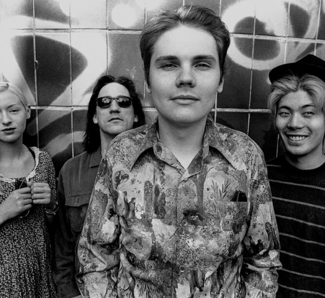 D'Arcy Wretzky (bass), Jimmy Chamberlin (drums), Billy Corgan (leadsinger and guitar), and James Iha (guitar) of the Smashing Pumpkins in 1993. (Credit: Paul Bergen/Redferns)