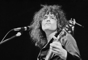 Marc Bolan of T-Rex, performing on stage during a concert in 1972. (Credit: Michael Putland/Getty Images)