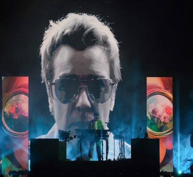 French electronic musician Jean-Michel Jarre performs onstage during a concert at Piazza San Marco in July 2025 in Venice, Italy. (Credit: Stefano Mazzola/Getty Images)