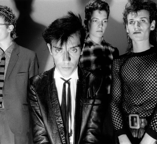 David J, Peter Murphy, Kevin Haskins, and Daniel Ash of BAUHAUS. (Credit: Fin Costello/Redferns)