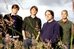 Benjamin Gibbard, Chris Walla, Nick Harmer, and Jason McGerr of Death Cab for Cutie in 2005. (Credit: Wendy Redfern/Redferns)