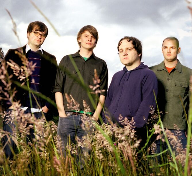 Benjamin Gibbard, Chris Walla, Nick Harmer, and Jason McGerr of Death Cab for Cutie in 2005. (Credit: Wendy Redfern/Redferns)