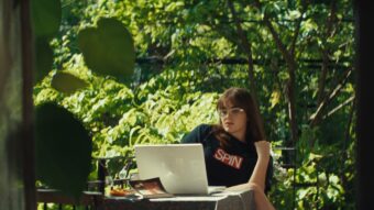 A scene from 'Mile End Kicks' with actor Barbie Ferreira, wearing the actual T-shirt writer/director Chandler Levack wore back in the day. (Courtesy of TIFF)