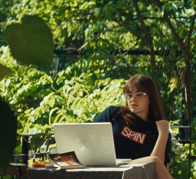 A scene from 'Mile End Kicks' with actor Barbie Ferreira, wearing the actual T-shirt writer-director Chandler Levack wore back in the day. (Courtesy of TIFF)