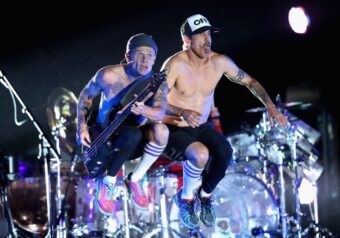 Flea and Anthony Kiedis of Red Hot Chili Peppers perform onstage during day 3 of the 2013 Coachella Valley Music & Arts Festival. (Credit: Christopher Polk/Getty Images for Coachella)