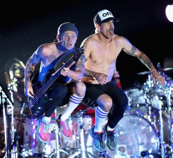 Flea and Anthony Kiedis of Red Hot Chili Peppers perform onstage during day 3 of the 2013 Coachella Valley Music & Arts Festival. (Credit: Christopher Polk/Getty Images for Coachella)